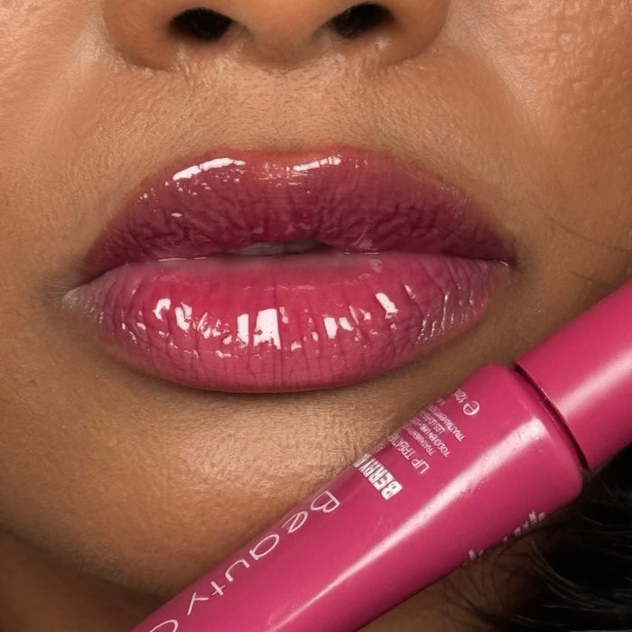Peptide Lip Treatment worn on lips for a hydrated plumped look