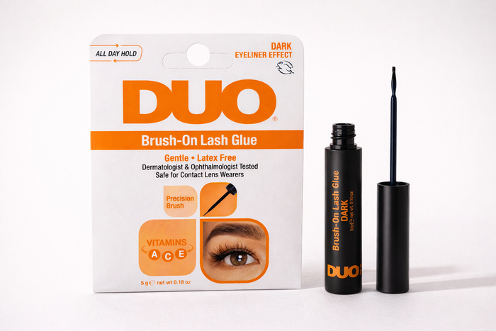 brush-on lash glue with dark eyeliner effect